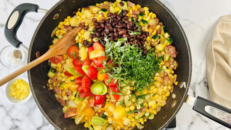 succotash ingredients in pan