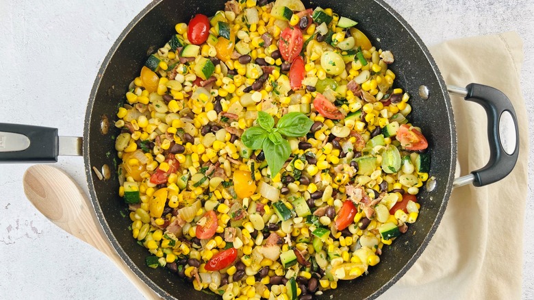 succotash with basil garnish