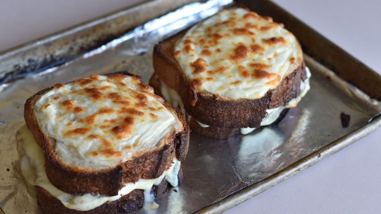 two broiled croque monsieur sandwiches