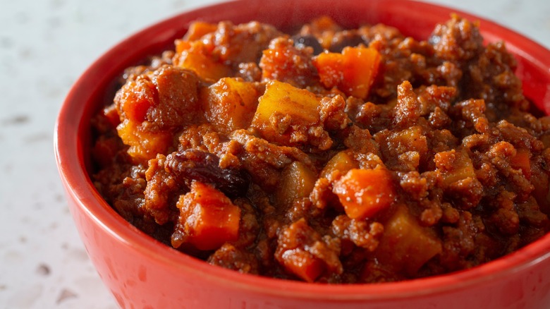 picadillo in a red bowl