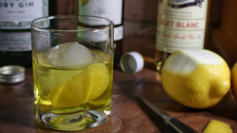 white negroni with liquor bottles