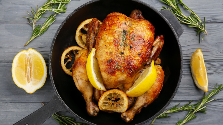 whole roast chicken stuffed with lemons