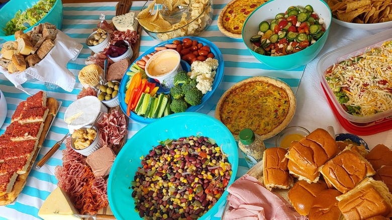 Table full of various foods in for a party