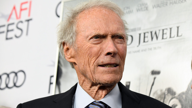 Clint Eastwood looks askance and upward.