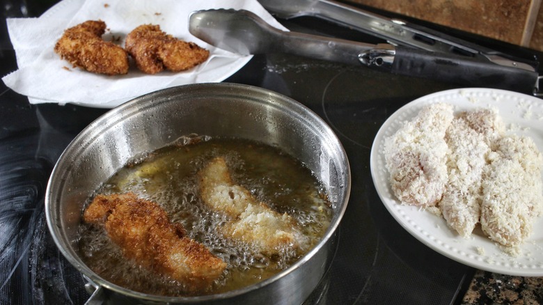 breaded chicken tenders in oil