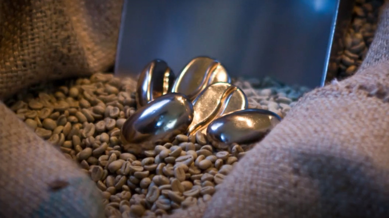 Coffee Joulies sit on top of a pile of coffee beans