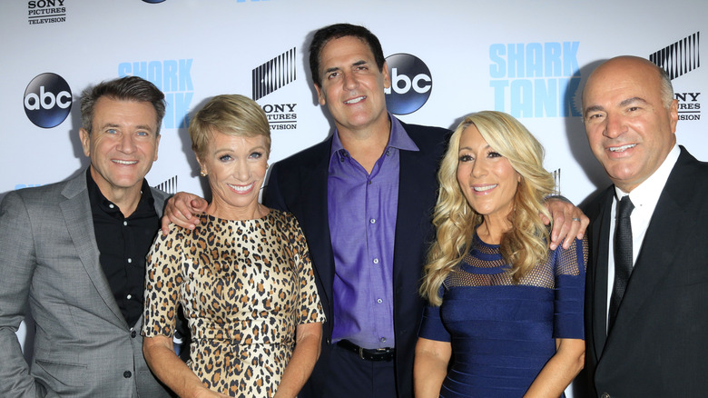The standard cast of Shark Tank sans Daymond John on an ABC red carpet