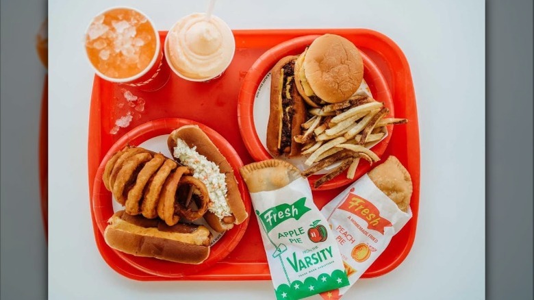Burgers, hot dogs, apple pies, and a milkshake from The Varsity