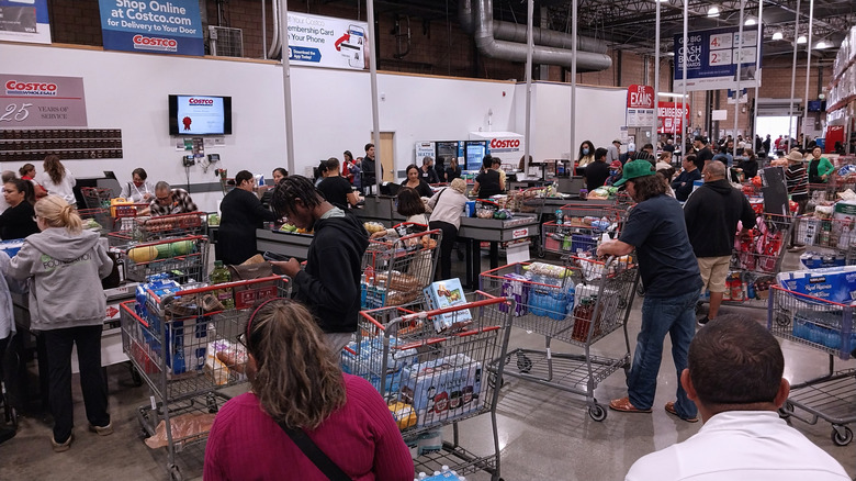 Lines of customers waiting to checkout at Costco
