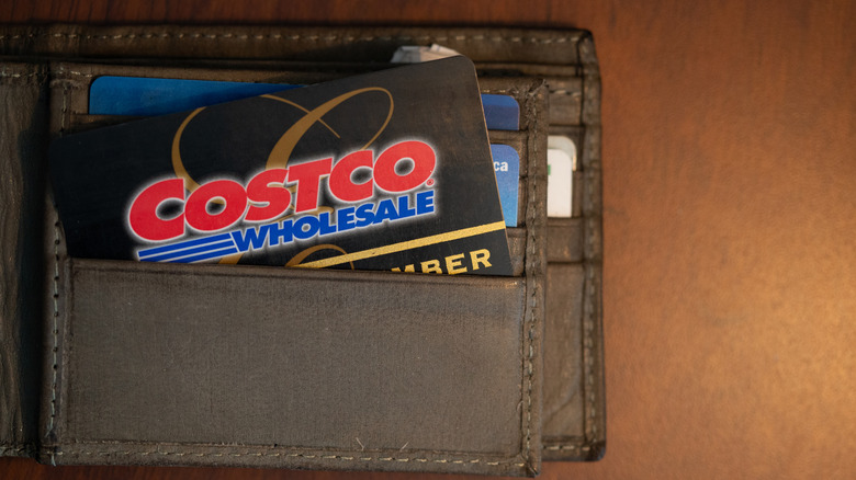 An open wallet with a visible Costco membership card
