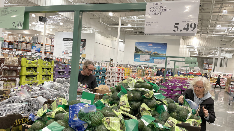 shoppers looking at Costco produce