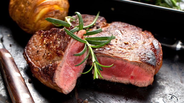 A sliced, medium-rare steak.