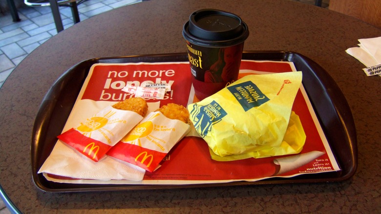 McDonald's hashbrowns, coffee and sausage and egg McMuffin