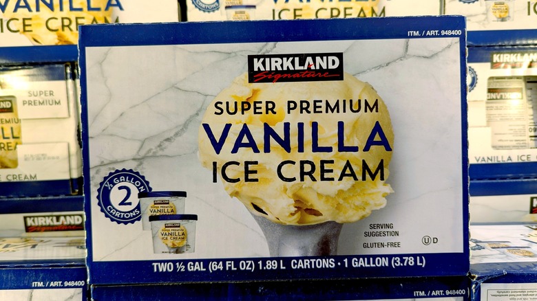 Boxes of Kirkland super premium vanilla ice cream in a freezer
