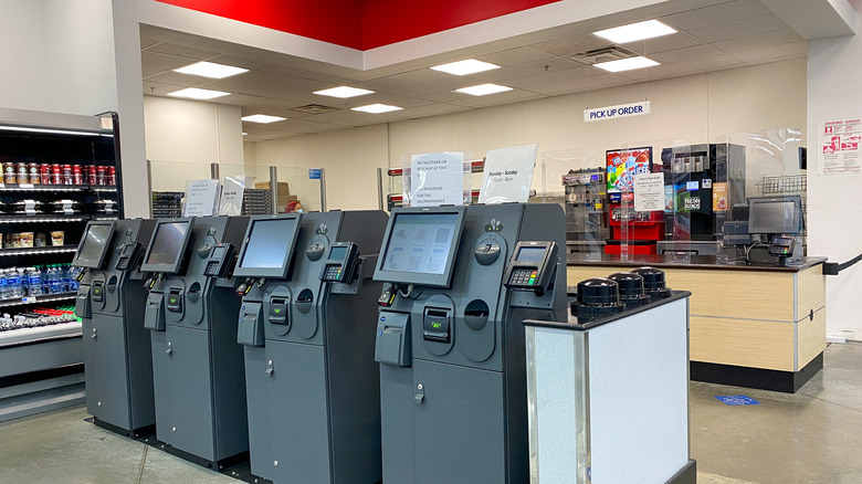 Order kiosks near grab and go items at a Sam's Club cafe