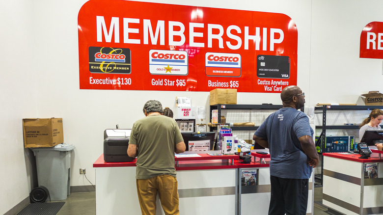 People at the membership desk at Costco