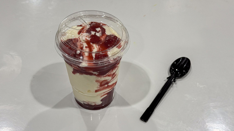Costco strawberry sundae with a spoon