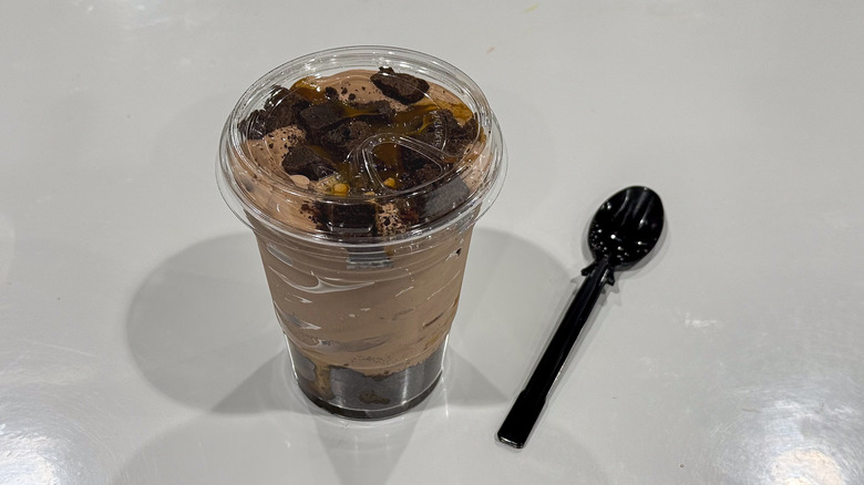 Costco caramel brownie with a spoon