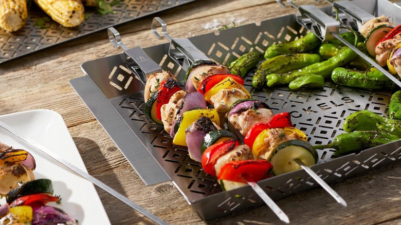 Meat and veggie kebabs on Henckels trays and skewers