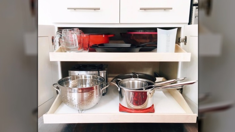 Cabinet organized with Slide-a-Shelf slide-out shelves
