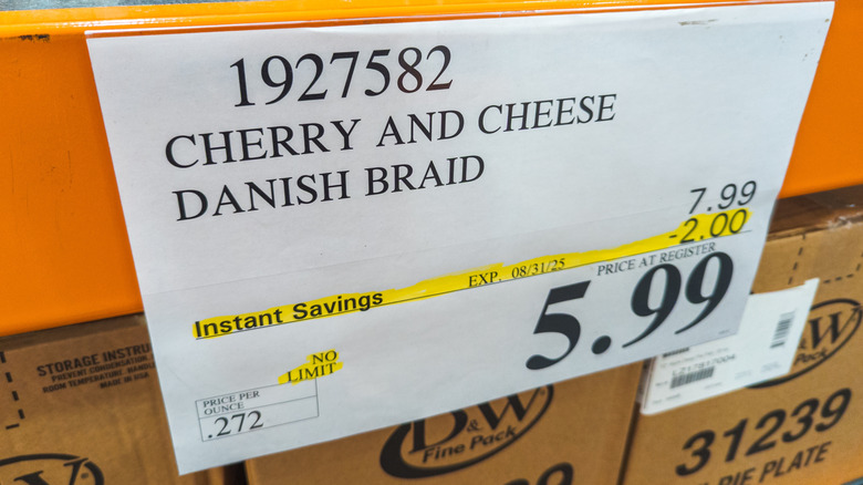 A Costco price tag with a discount.