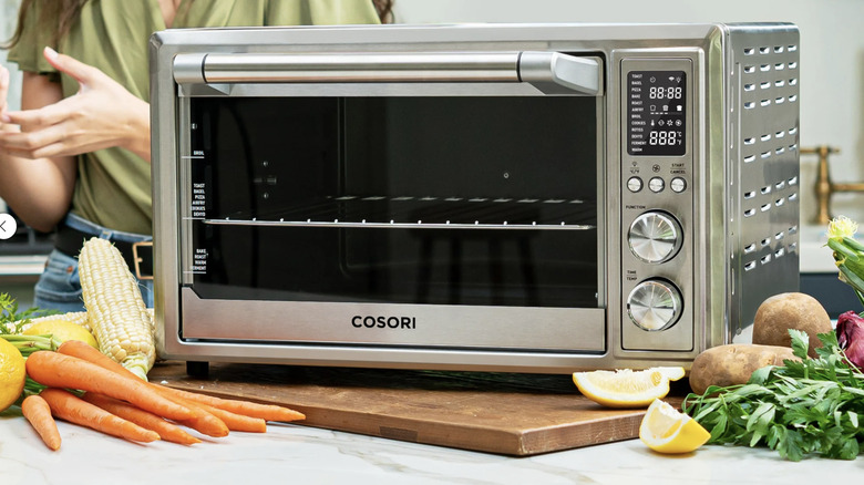 Cosori air frying toaster oven in a kitchen