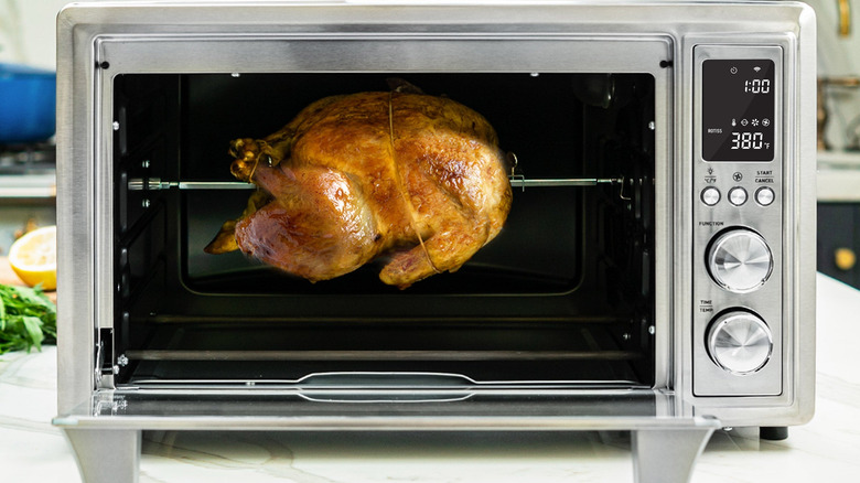 Rotisserie chicken cooking in a Cosori appliance