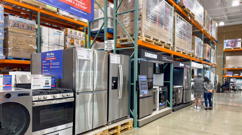 Appliances on display in a Costco warehouse store