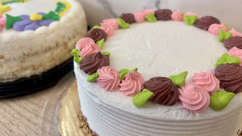 Two decorated cakes on table
