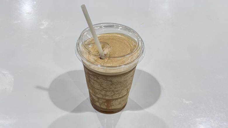 Costco cold brew caramel freeze with a straw