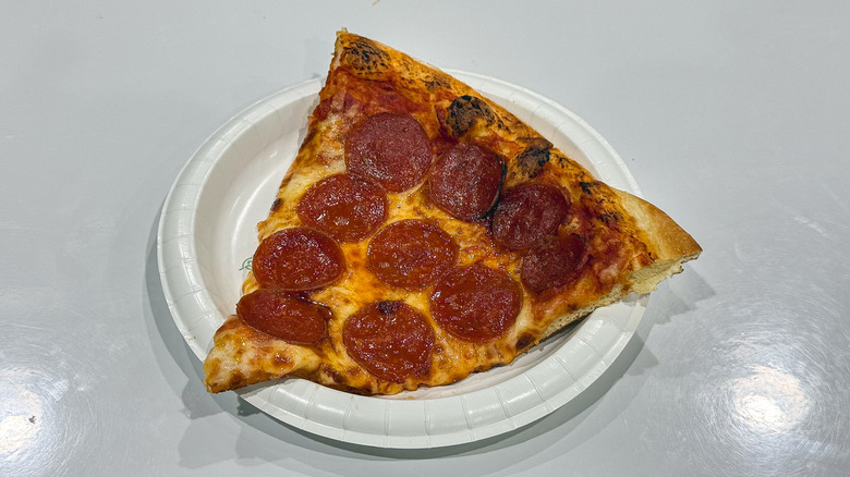 Costco pepperoni pizza on a plate