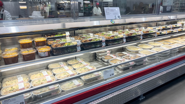 A Costco refrigerated aisle full of pre-packaged meal kits