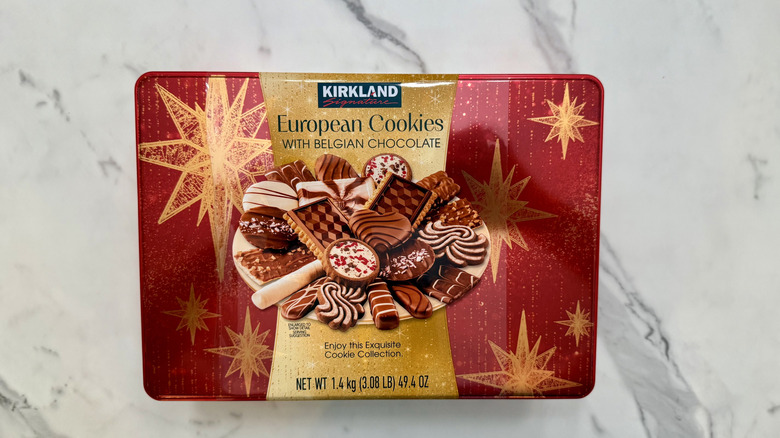 A tin of Kirkland Signature European Cookies sits against a marbled backdrop