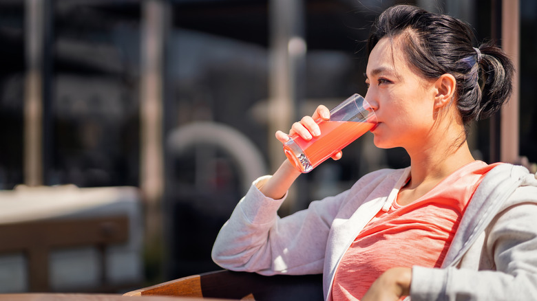 Woman drinking energy drink