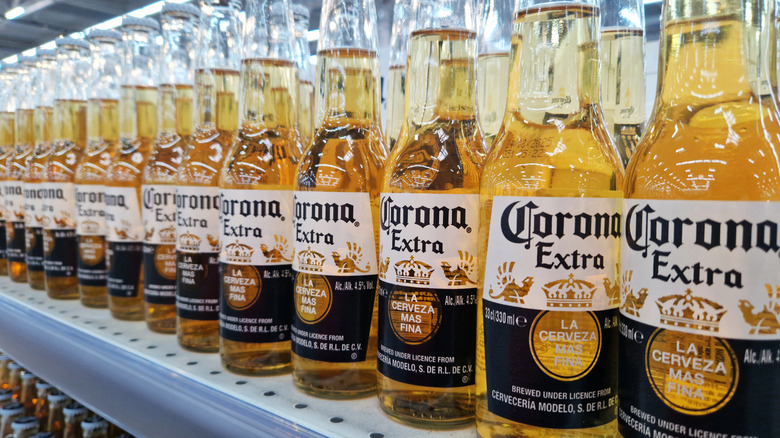 Corona beers sold on shelf.