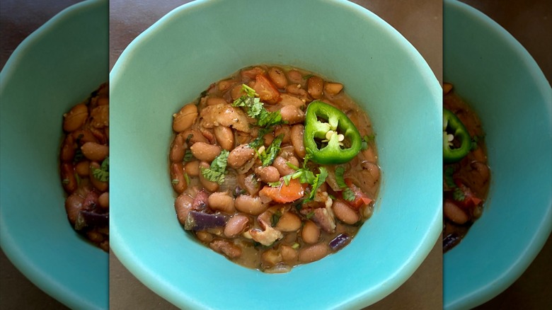 Bowl of charro beans served.