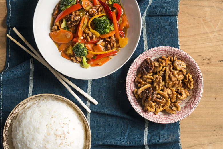 Deep-frying walnuts before adding them to a stir-fry helps keep everything crisp and crunchy.