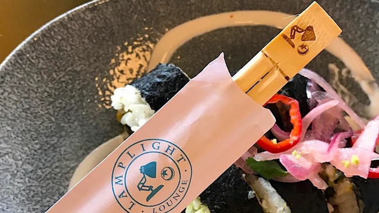 Pixar branded Cropsticks in packet with plate of food