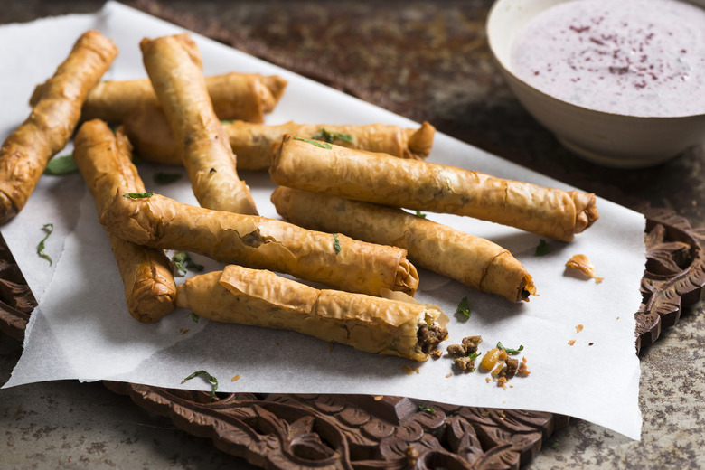 Serve these spiced lamb cigars hot out of the deep fryer with cool, tangy sumac-yogurt dip.