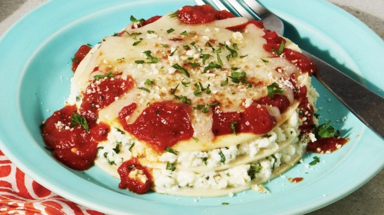 Lasagna bowl served in a blue dish
