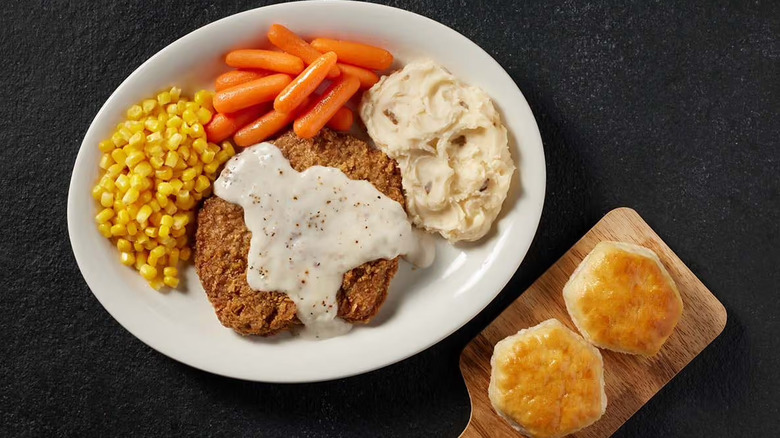 Cracker Barrel's Country Fried Steak with mashed potatoes, corn, and green beans