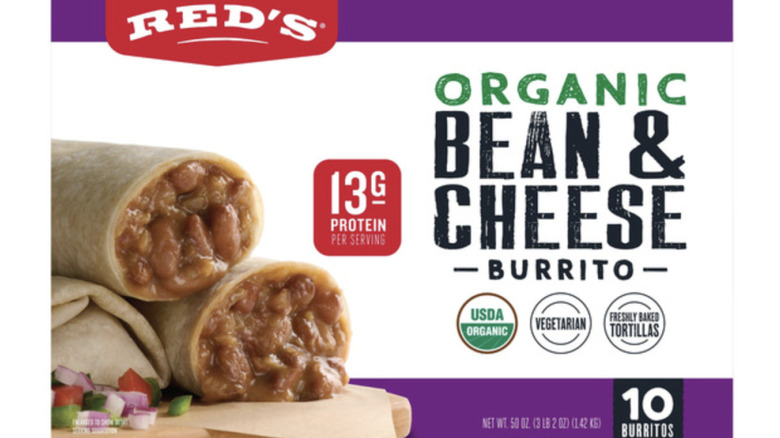 3 bean and cheese burritos with two showing the inside filling.