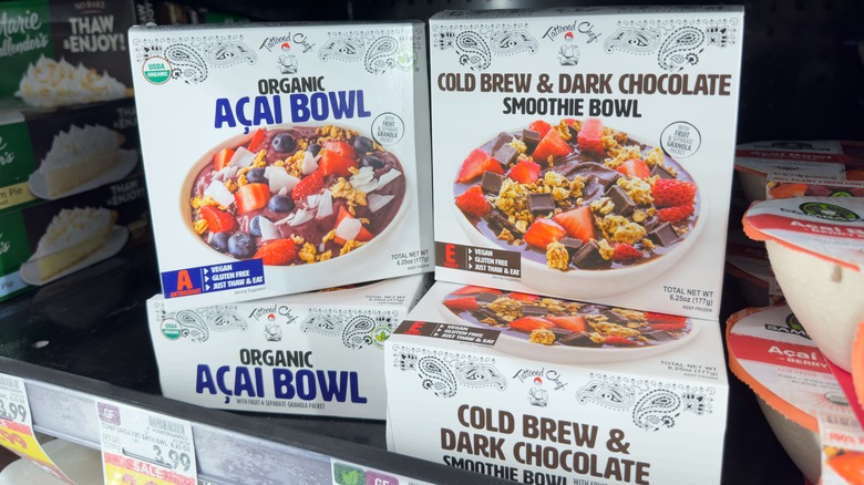 Two acai bowl boxes displayed in a store drawer