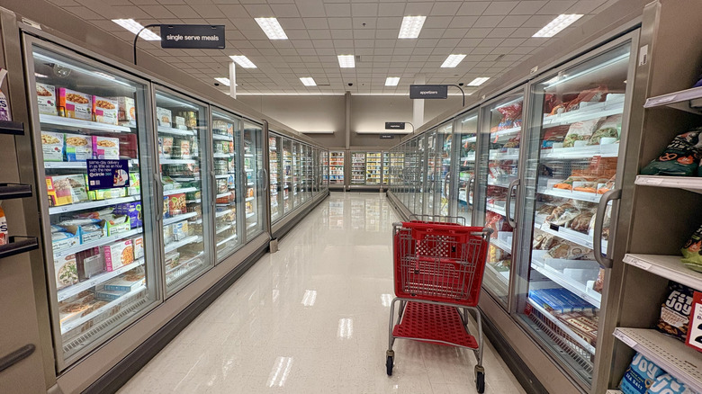 A Target cart in a freezer aisle.