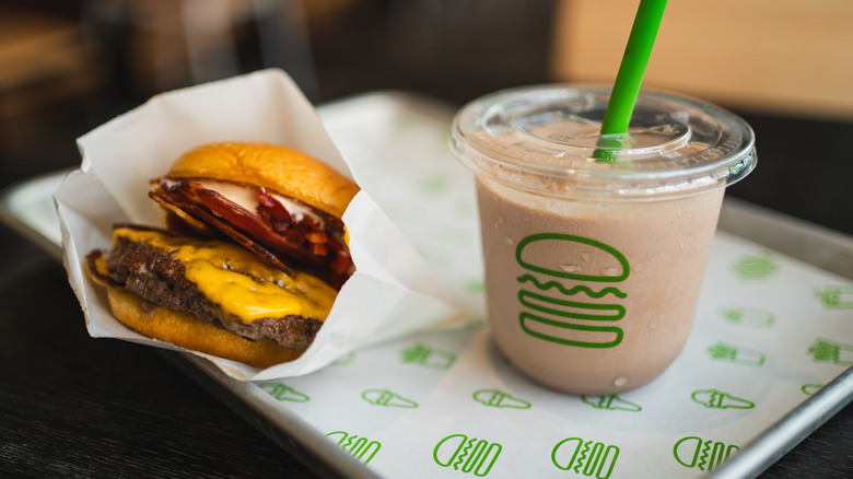 Shake Shack burger and milkshake on a tray