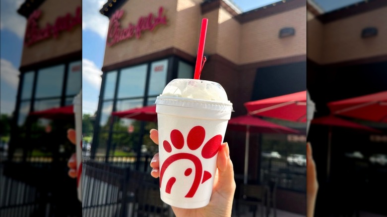 Person holding a Chick-fil-A milkshake