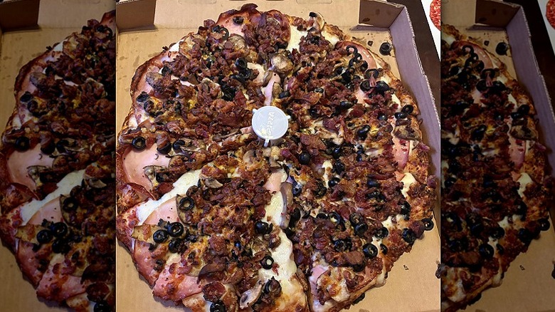 A loaded Mountain Mike's Pizza
