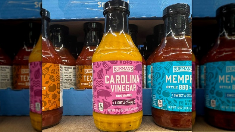 Bottles of Aldi barbecue sauce on shelves