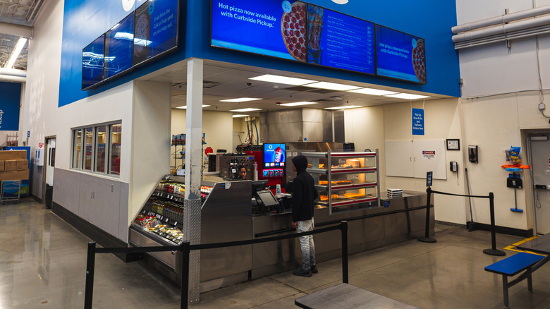 Someone orders at a Sam's Club Café.