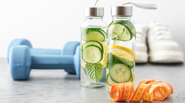 water bottle with fruit and cucumber